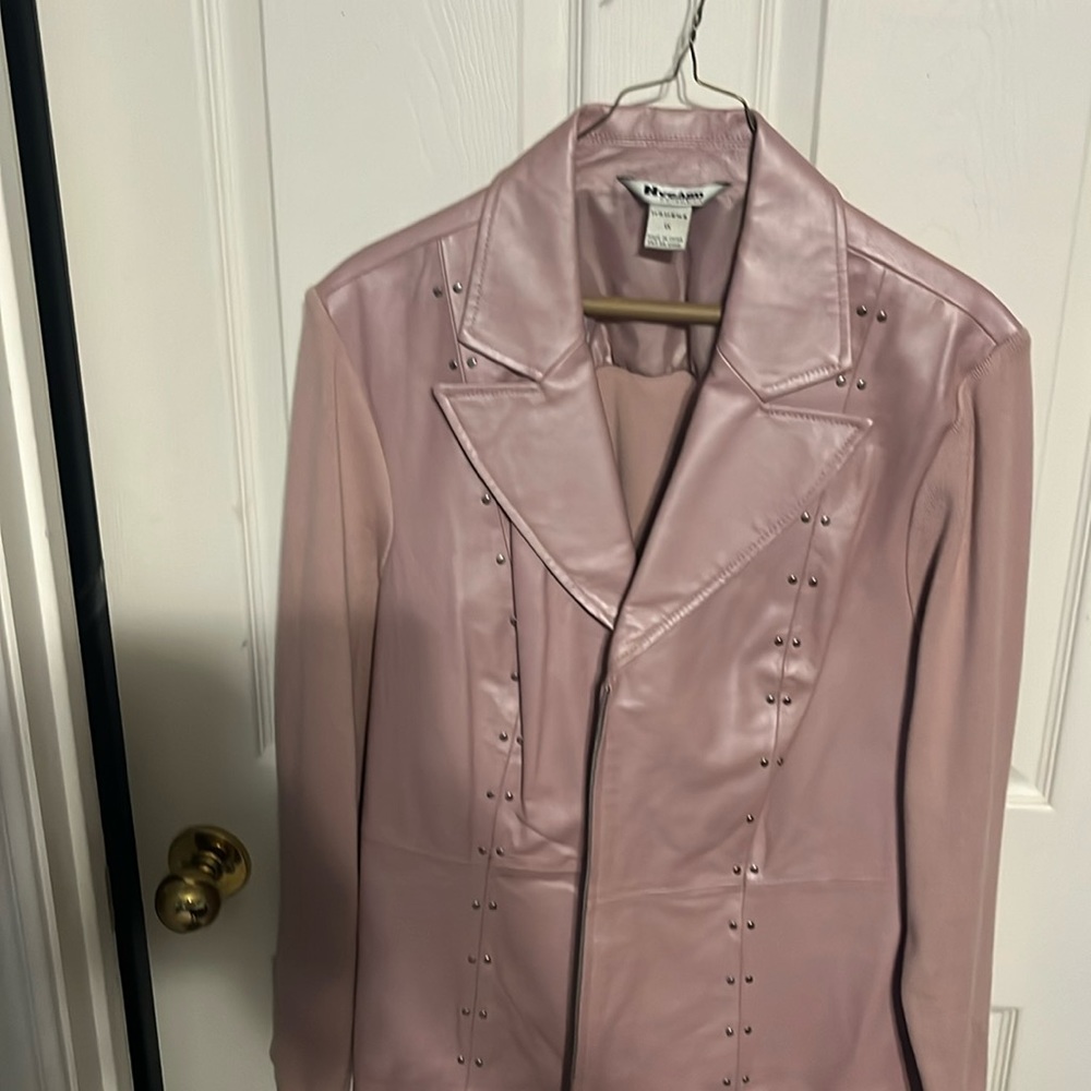 Pink blazer. Size 1x. Silver studs, pink leather and back is cotton stretch.